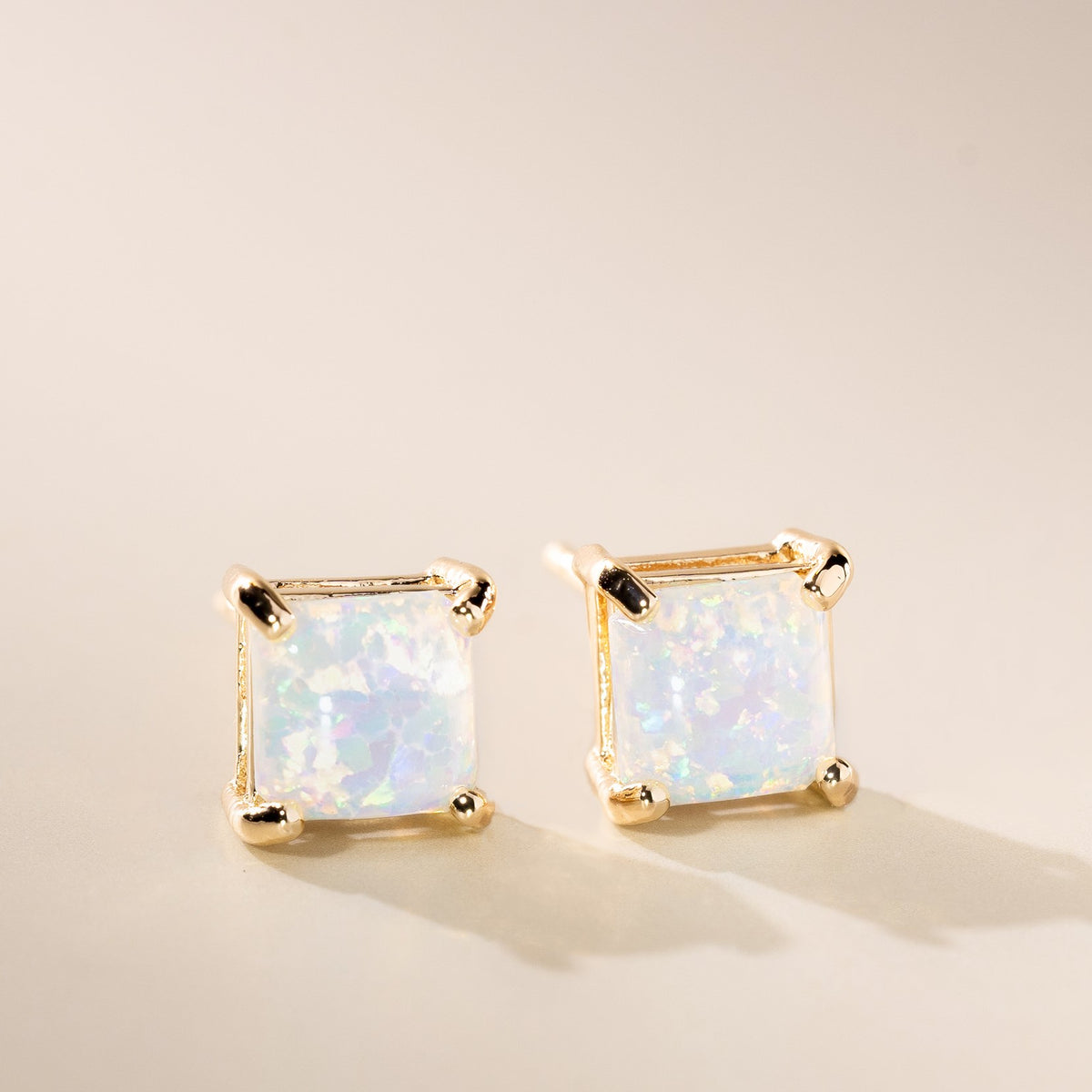 Gold opal studs