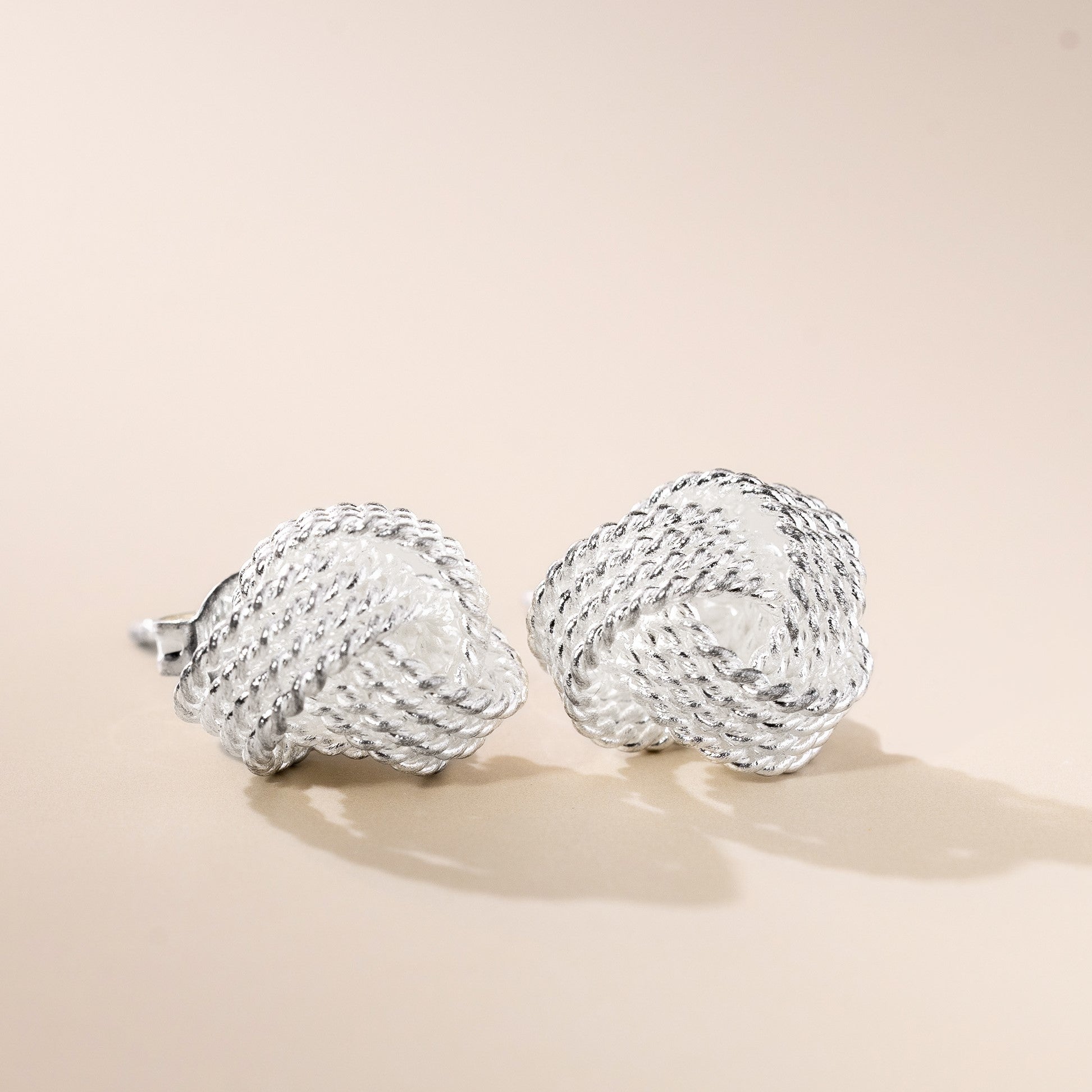 Tennis knot silver earrings