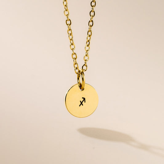A gold-plated Sagittarius pendant necklace on a gold-plated chain, featuring laser engraving on the pendant.