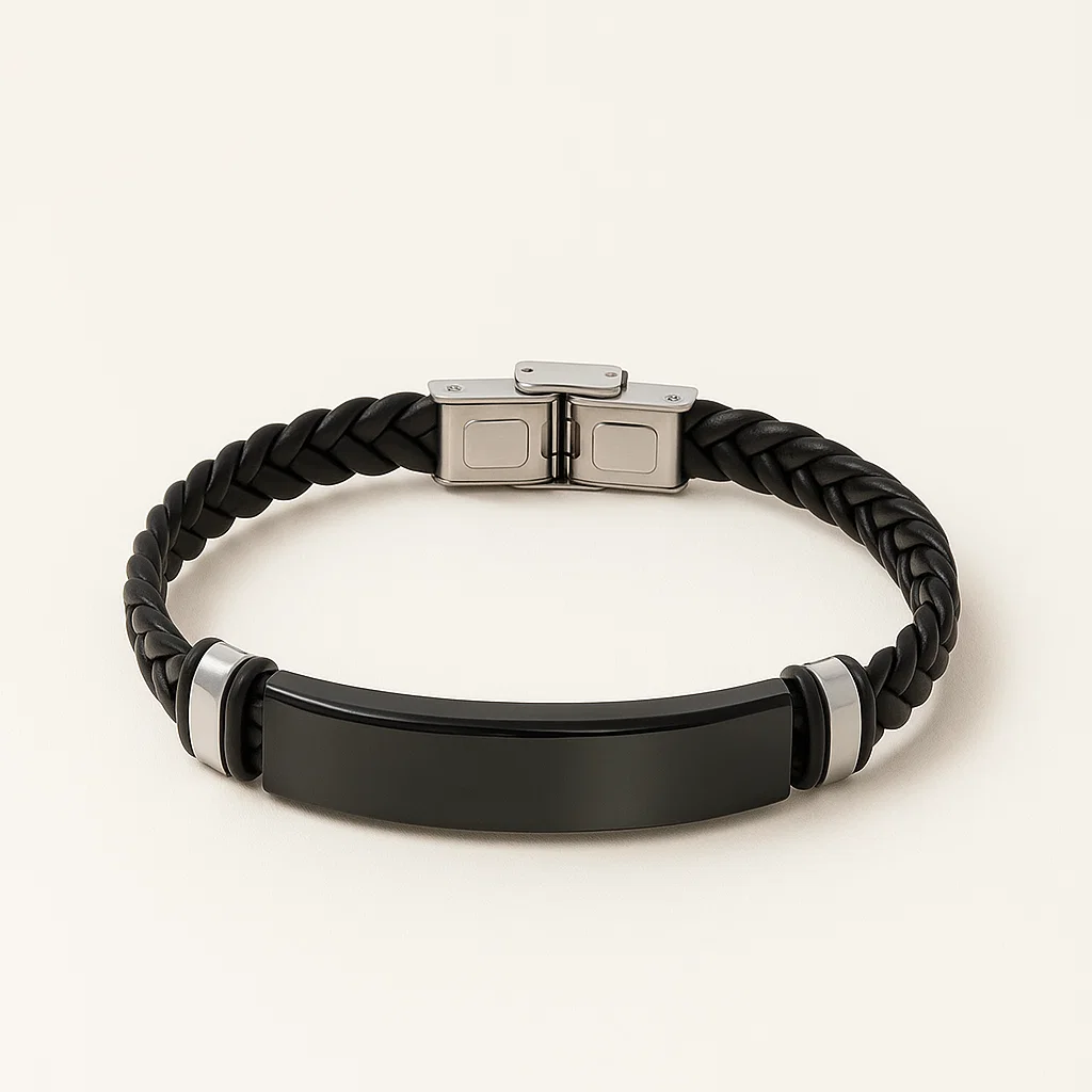 Black braided bracelet with a metallic clasp on a light background