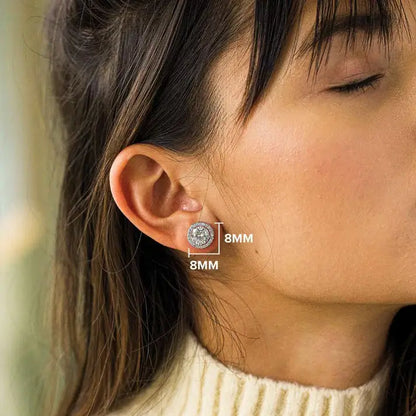 Close-up of a person wearing an earring with size measurement overlay.